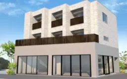 目抜き通り商店街の角地に面する1階路面店です。外観